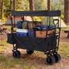 Collapsible wagon in black with removable canopy, spacious storage, and all-terrain wheels for outdoor adventures.
