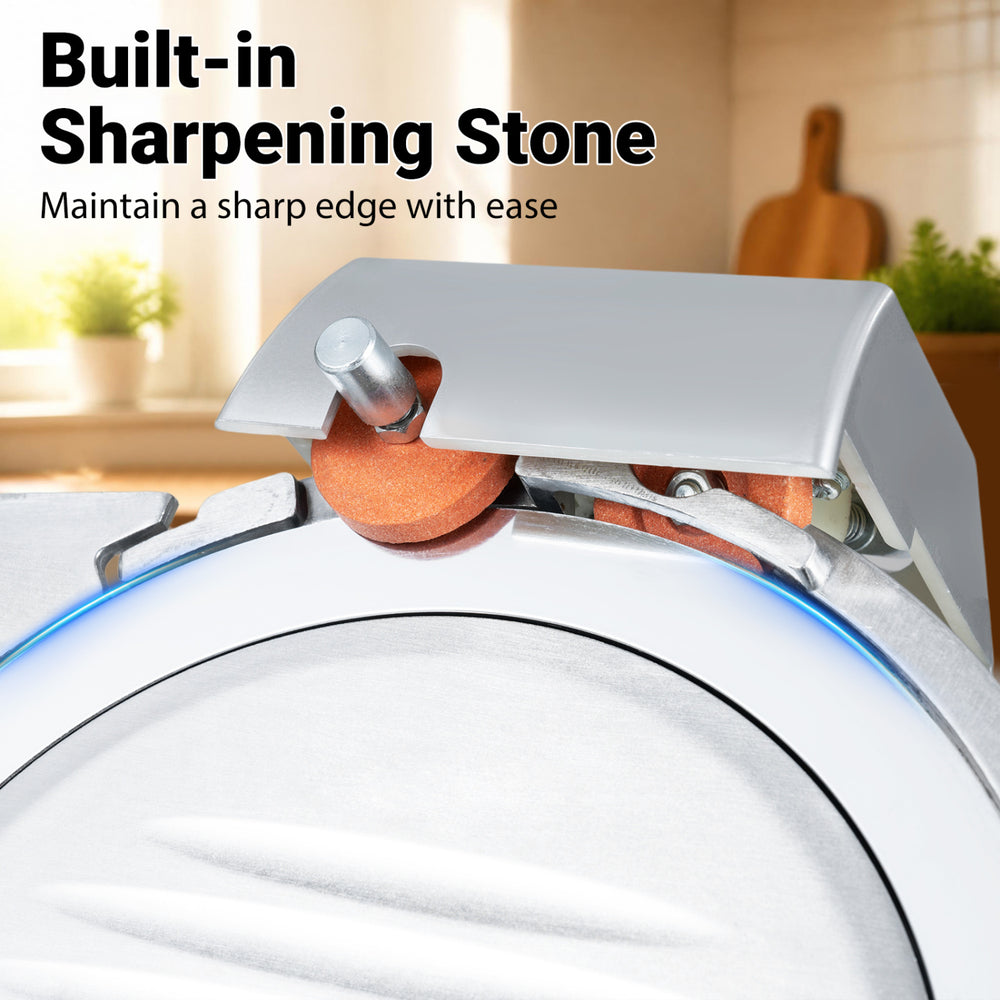 Close-up of the built-in sharpening stone on the commercial meat slicer for maintaining a sharp carbon steel blade.