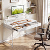 Compact office desk in white with removable monitor shelf and dual-use drawer, perfect for home or office use.