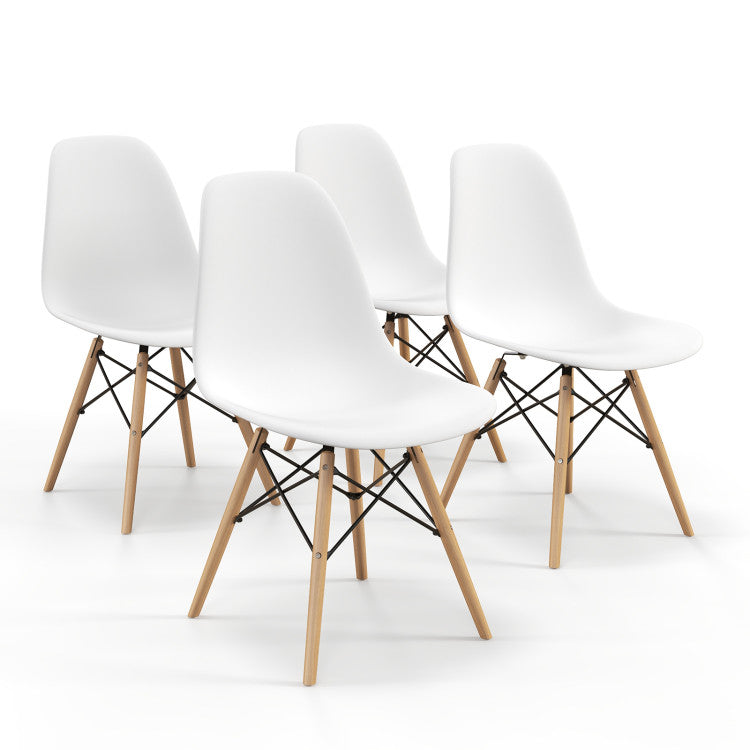 Four modern white plastic dining chairs with wooden legs, featuring ergonomic curved backs for comfort in any dining.