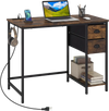 Close-up view of the computer desk's fabric drawers and headphone hook, showcasing rustic brown design and storage.