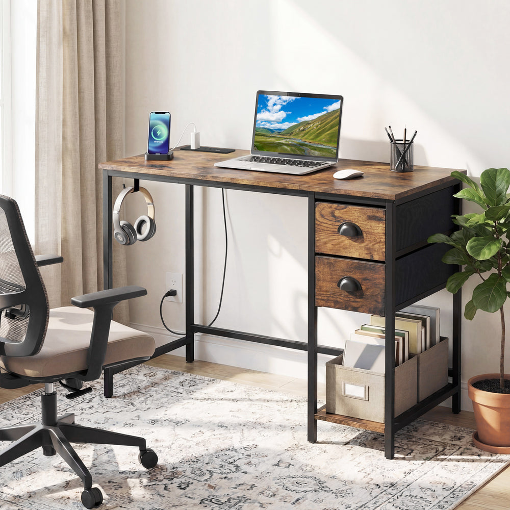 Computer desk in rustic brown with a spacious tabletop and convenient headphone hook, ideal for small spaces.