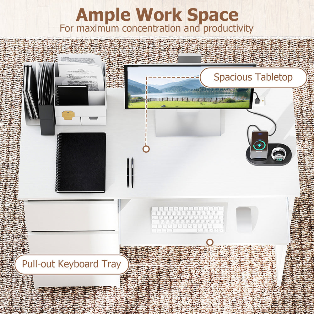 Computer desk with spacious tabletop, pull-out keyboard tray, and built-in power outlet for home office organization.