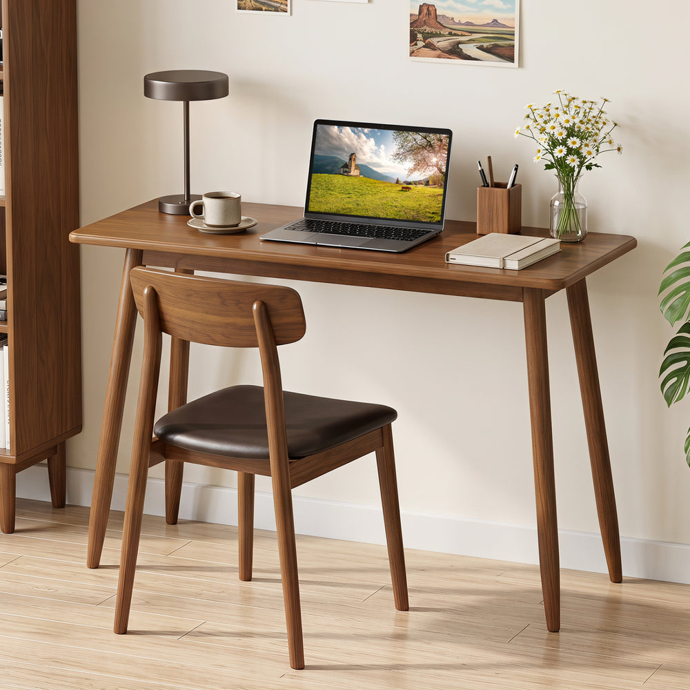 Computer desk with rubber wood legs and spacious walnut tabletop, perfect for studying, working, or dining.