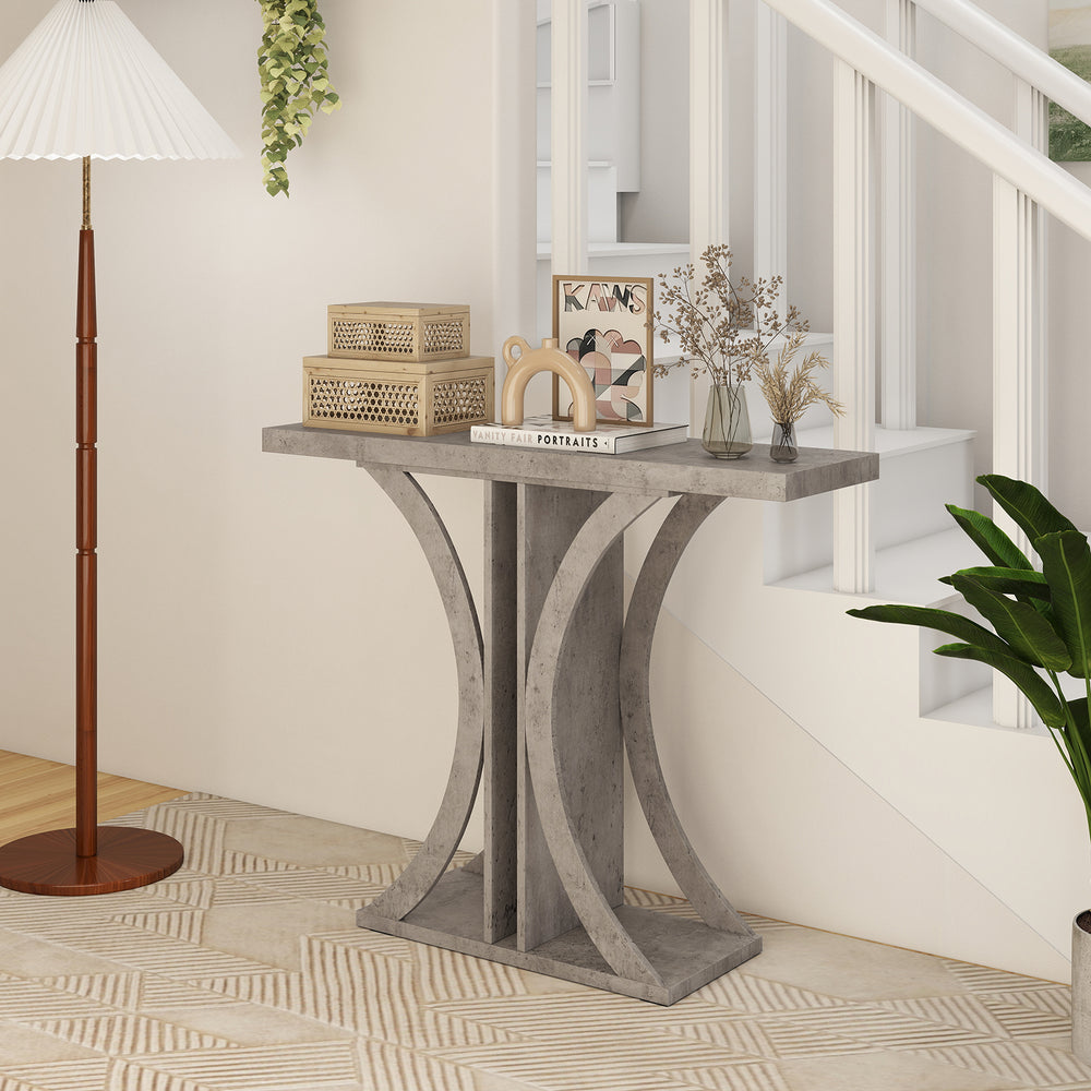 Gray console table with geometric frame, offering ample storage and display space for decor in entryway or hallway.