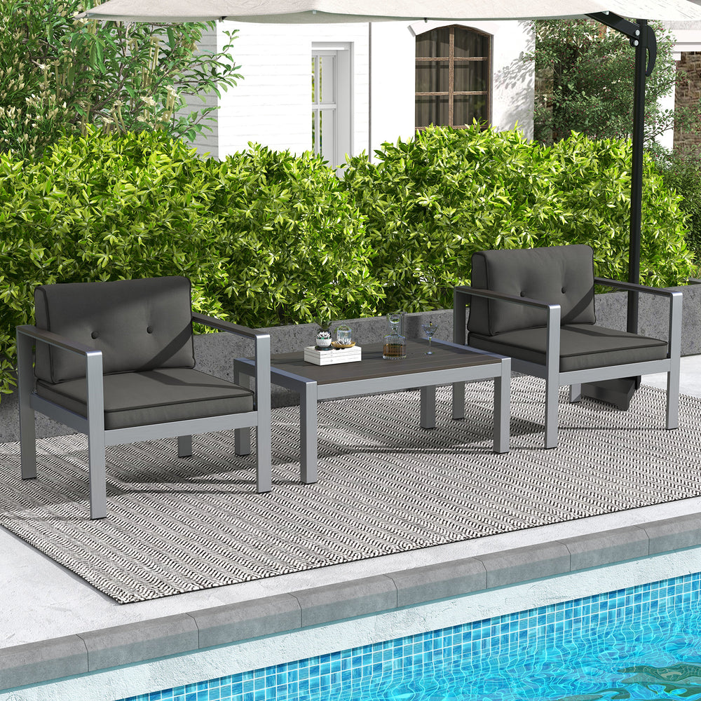 Contemporary gray sofa chairs with WPC armrests and back cushions, perfect for poolside relaxation.