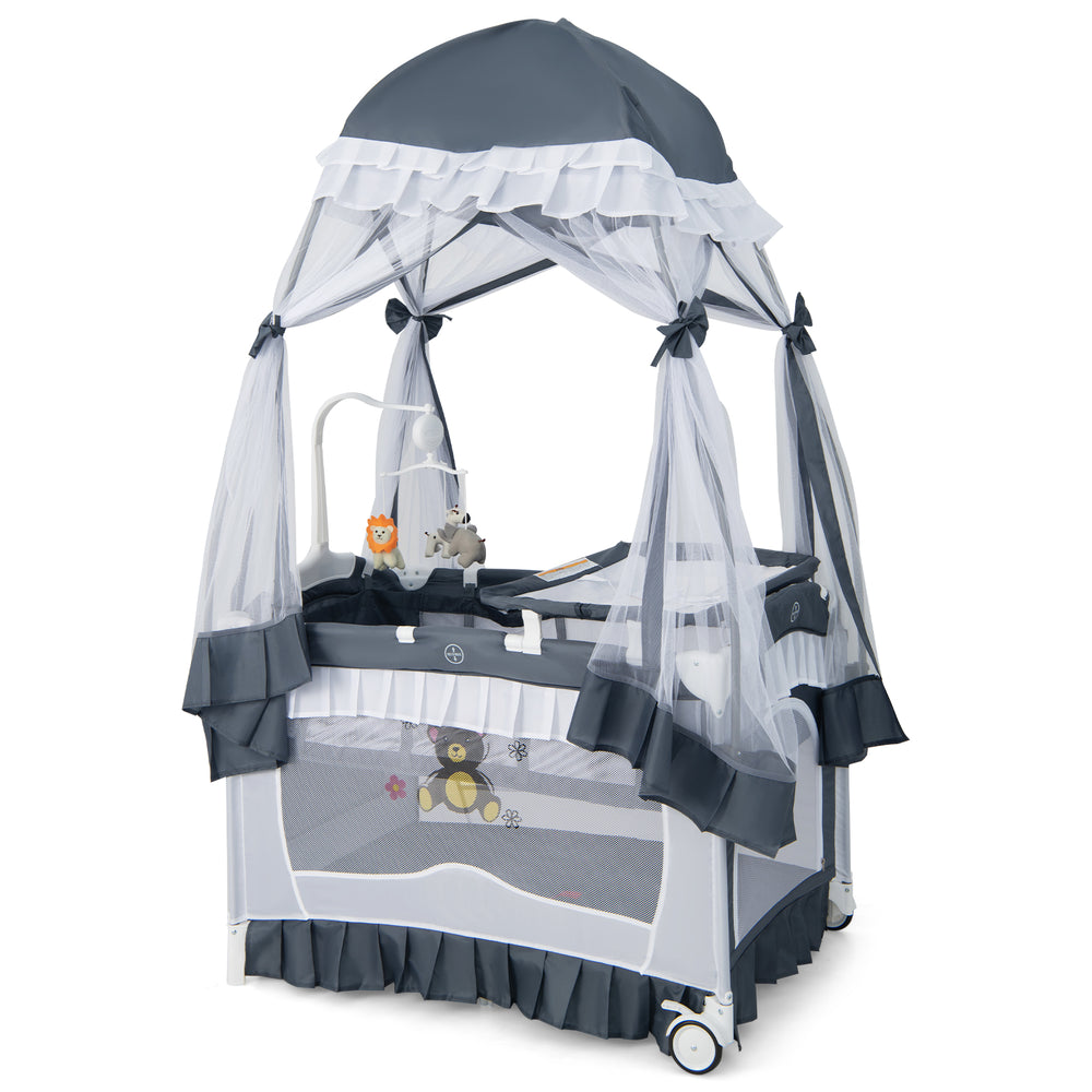 Convertible bassinet with removable changing table and detachable mesh net in grey, ideal for infants up to 3 years.