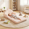 Convertible kids sofa in beige, featuring soft teddy fleece, used as a lounge bed for reading and relaxing.