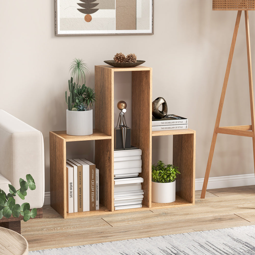 Geometric Convex bookshelf with three open shelves, ideal for organizing books and decor in living room or office.