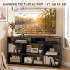 Corner TV stand in black for flat screen TVs up to 55 inches, featuring adjustable shelves and ample storage space.