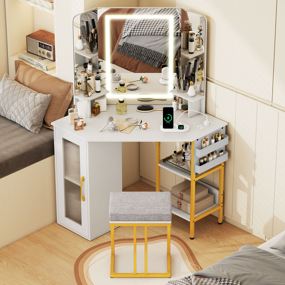 Corner vanity desk with triple mirror and lights, featuring adjustable brightness, storage for cosmetics, and a.
