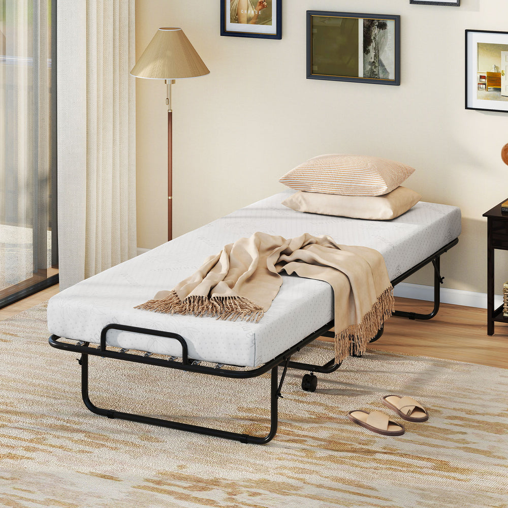 Folding bed frame with 4-inch memory foam mattress, metal construction, ideal for guest rooms or small spaces.