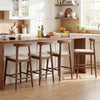 Counter height bar stools with curved backs in walnut, featuring soft upholstery and ergonomic design for kitchen.