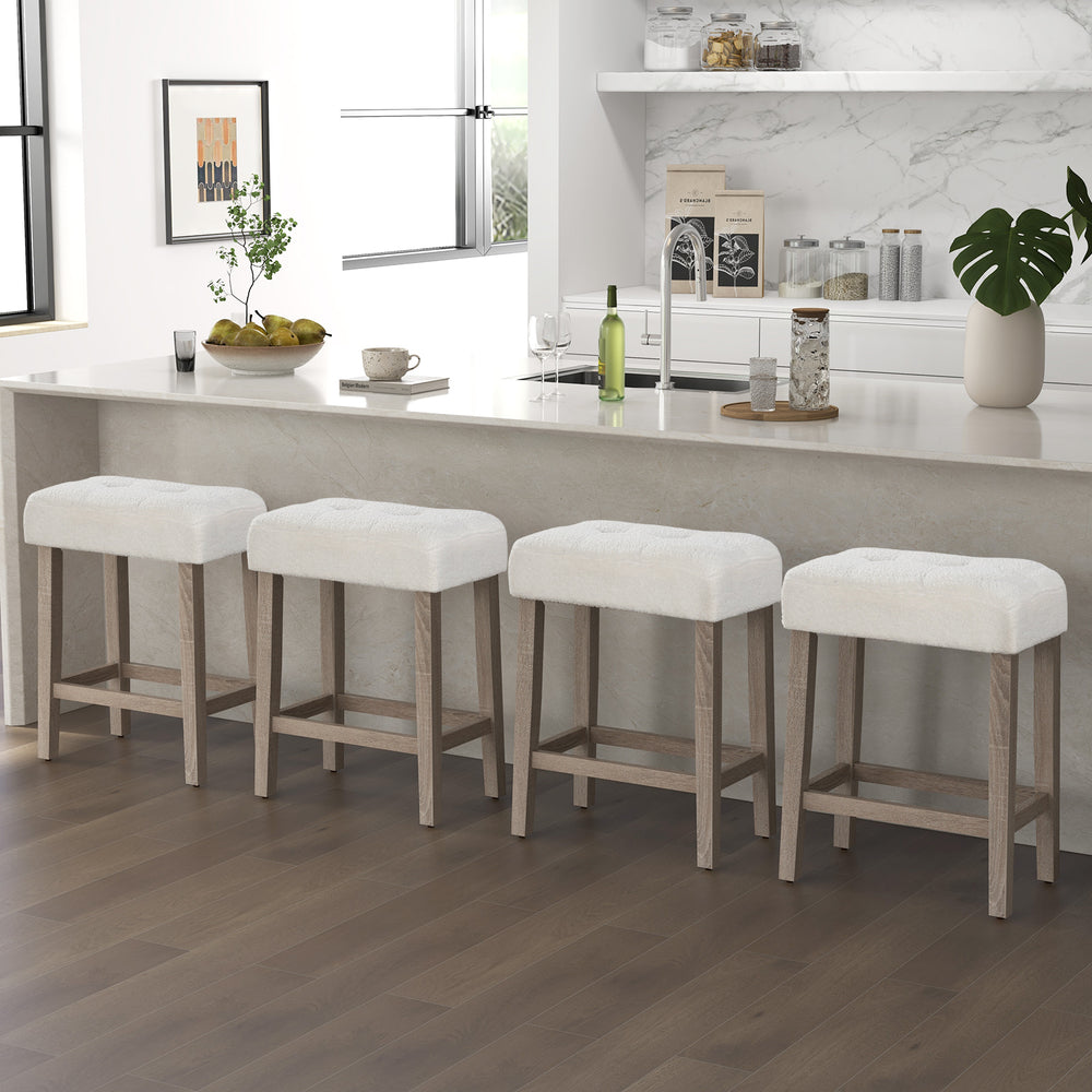 Set of two modern counter height bar stools with rubber wood legs and plush white sherpa fabric, perfect for kitchen.