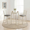 Counter height chairs with beige fabric seats and rubber wood legs, perfect for elegant dining and gatherings.