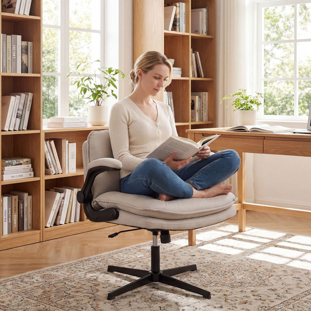 Criss Cross ergonomic office chair in beige with adjustable height and wide backrest, perfect for home reading.