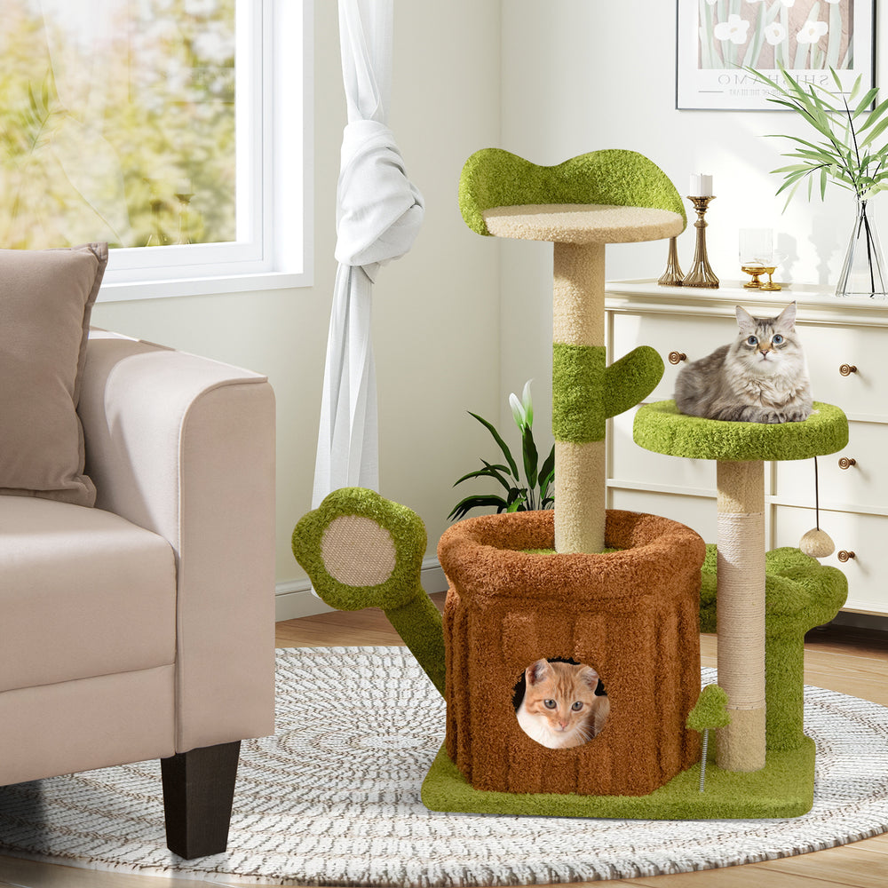 Cat tree activity center in green with trunk condo, flower perch, and scratching posts for indoor play and relaxation.