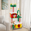 Multicolor Christmas cat tree with gift box condos, scratching posts, and plush pompom toys for indoor cats.