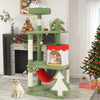 Cute Christmas cat tree in green with scratching posts, gift box condo, and hammock for festive feline fun.