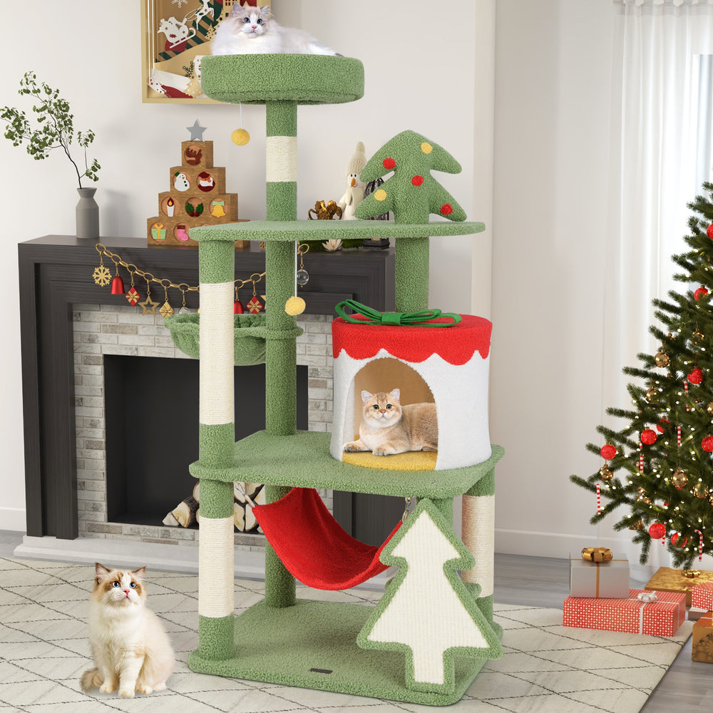 Cute Christmas cat tree in green with scratching posts, gift box condo, and hammock for festive feline fun.