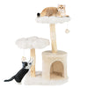 Cat tree with natural wood branches, plush flower design, and sisal scratching posts for playful lounging and.