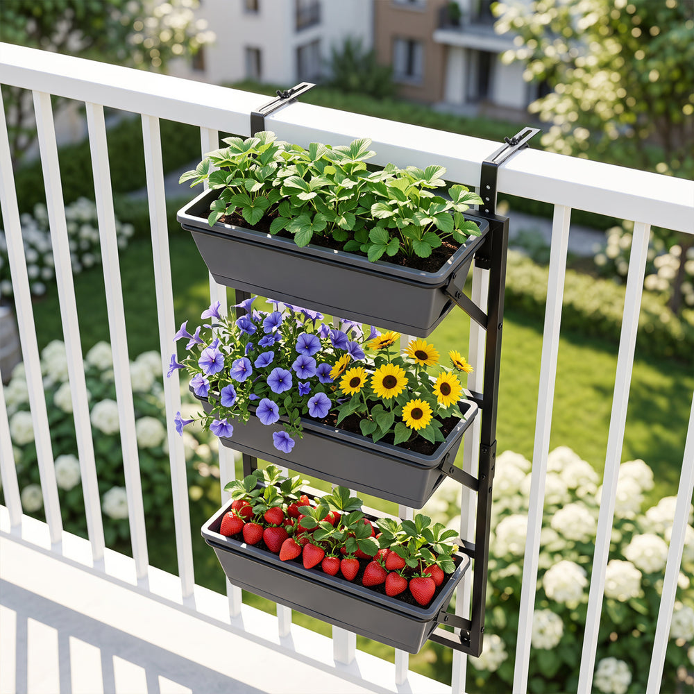 Three-tier black deck railing planter boxes with adjustable brackets, ideal for growing herbs, flowers, and vegetables.