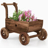 Decorative wooden wagon cart in rustic brown, featuring a drainage hole, for displaying flowers and plants.