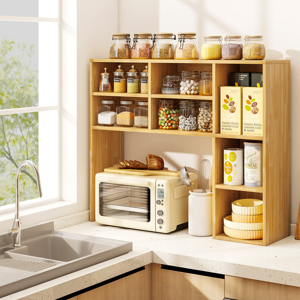 Desktop bookshelf with 7 open cubbies and 3 adjustable shelves, perfect for organizing books and decor in any space.