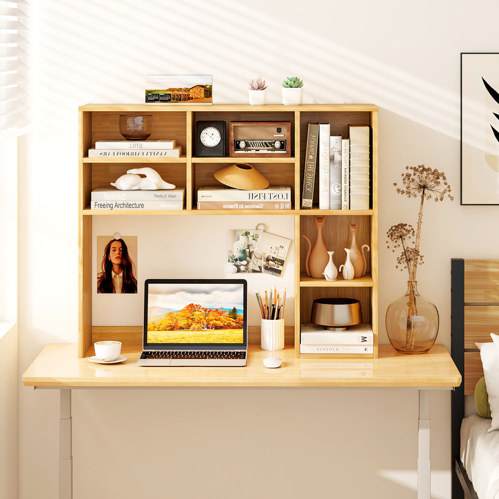 Desktop bookshelf in yellow with 7 open cubbies and 3 adjustable shelves, perfect for organizing a computer desk.