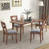 Gray dining chair with a unique hollowed backrest and padded seat, offering rustic charm and ergonomic support for.