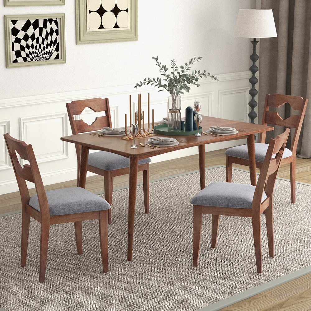 Gray dining chair with a unique hollowed backrest and padded seat, offering rustic charm and ergonomic support for.