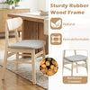 Natural rubber wood dining chair with ergonomic backrest and fabric upholstery, ideal for kitchen or dining room use.