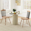 Set of 2 natural dining chairs with spindle back and ergonomic contoured seat, perfect for stylish dining spaces.