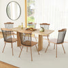 Set of two dining chairs with spindle back and ergonomic contoured seat in natural wood finish for stylish dining.