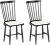 Set of 2 black farmhouse dining chairs with removable seat cushions and ergonomic curved backrest for comfort.