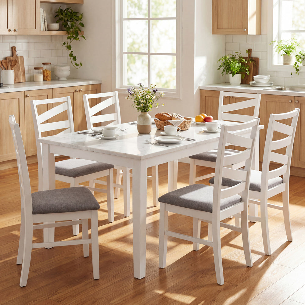 Set of two white dining chairs with rubber wood frames and breathable linen upholstery, ideal for kitchen or dining.