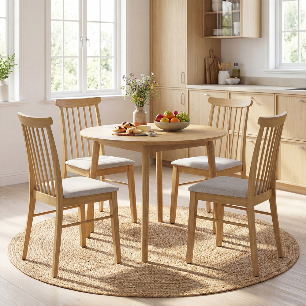 Set of 4 natural rubber wood dining chairs with fabric upholstery, featuring spindle backrests for comfort and style.