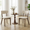 Two dining chairs with solid rubber wood frames and linen fabric covers, perfect for dining rooms and kitchens.