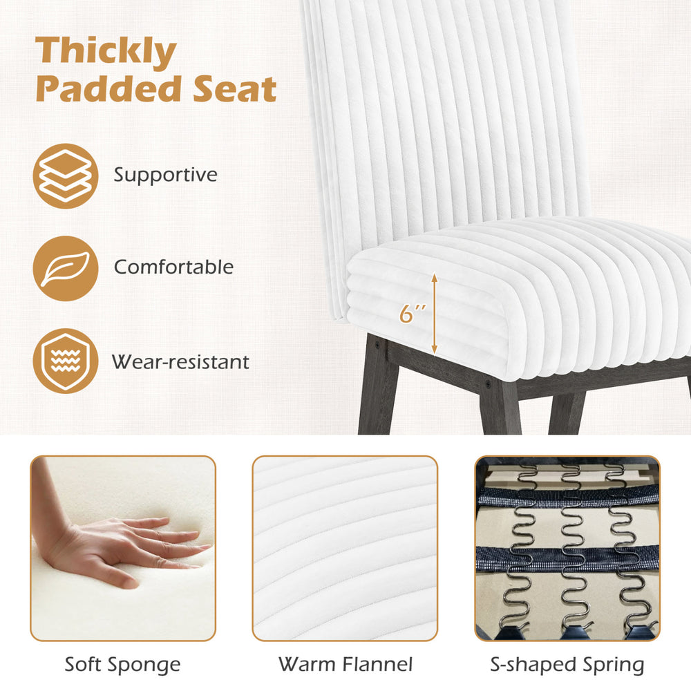 Thickly padded gray and white dining chair with soft sponge seat and supportive S-shaped spring for kitchen or dining.