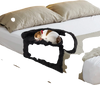 Plush calming dog couch bed in black with anti-slip bottom, providing a soft surface for pets to relax on.