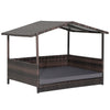 Outdoor wicker dog house with weatherproof roof and gray cushion, perfect for indoor and outdoor use.