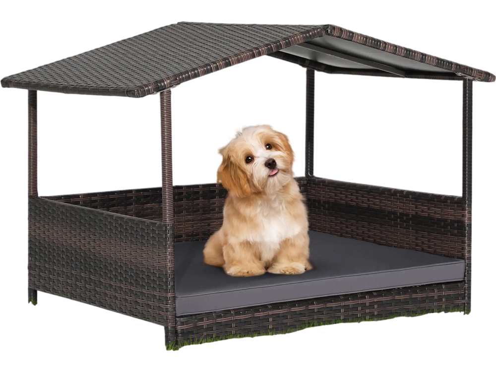 Outdoor wicker dog house with weatherproof roof and soft cushion, perfect for yard or garden use.
