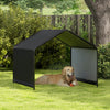 Dog shade shelter in black with waterproof roof, providing cool outdoor space for pets in a garden setting.