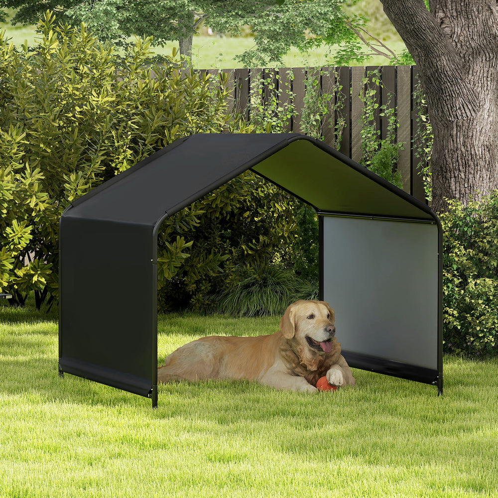 Dog shade shelter in black with waterproof roof, providing cool outdoor space for pets in a garden setting.