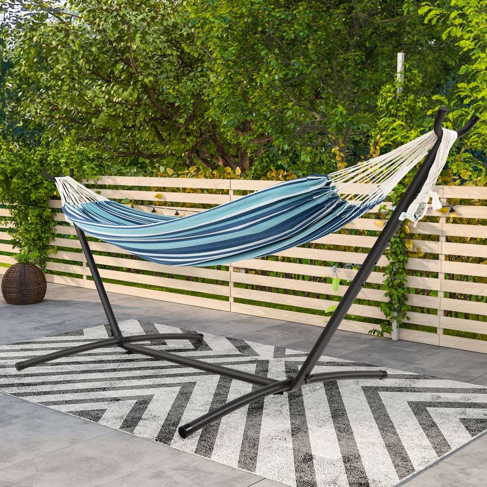 Double hammock set in blue with adjustable height, sturdy stand, and tropical design, perfect for outdoor relaxation.