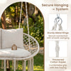 Double swing chair with supportive cushions, sturdy metal rings, and thickened cotton ropes for indoor or outdoor use.