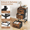 Dresser nightstand with three roomy fabric drawers and a sturdy metal frame, ideal for bedroom storage solutions.
