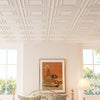 White 3D decorative drop ceiling tiles in a room setting, showcasing the premium PVC material and modern design.