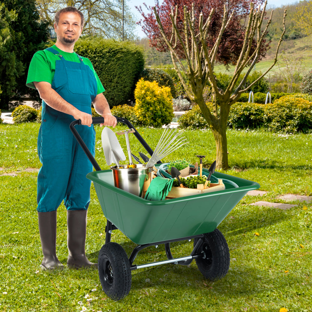 Dual-wheel garden utility cart in green with pneumatic tires, ideal for transporting materials like gravel and mulch.
