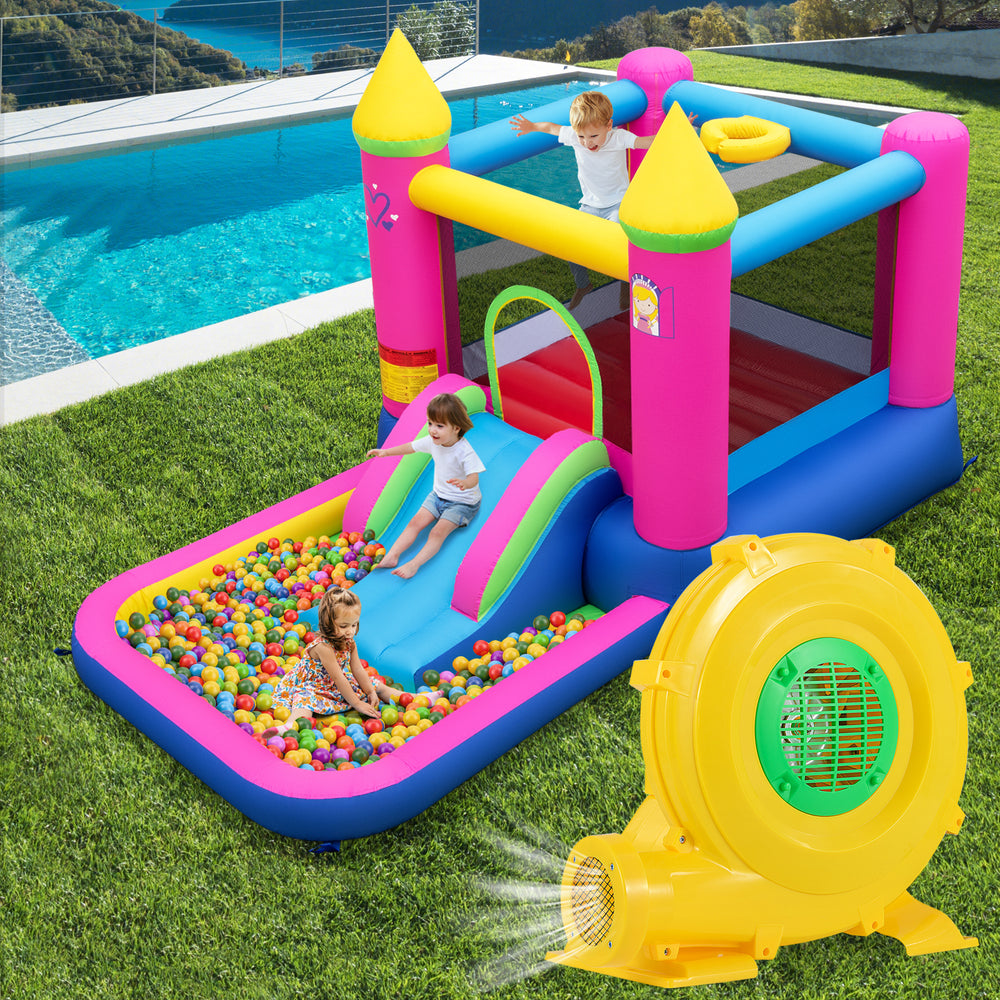 Brightly colored inflatable bounce house with slide and ball pit, featuring a 780W portable air pump for quick setup.